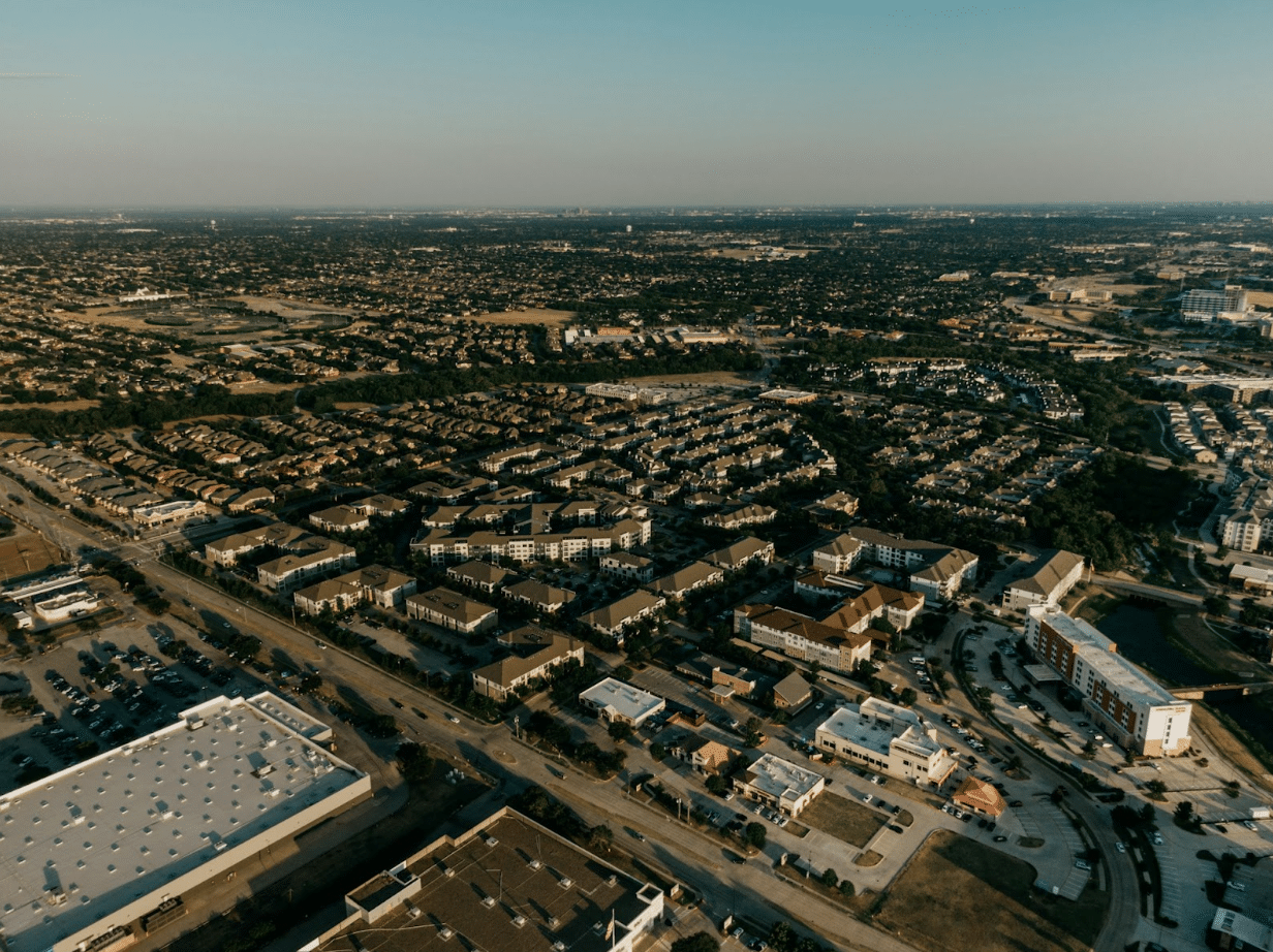 Advanced tree health monitoring techniques for Dallas residents using aerial views of urban trees and neighborhoods.